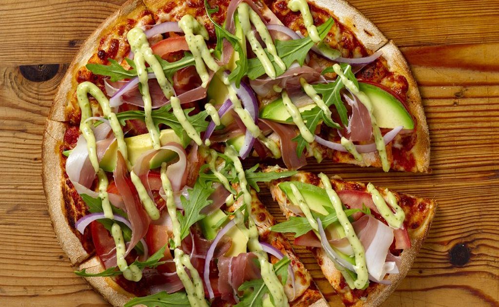 Mouth-watering pesto chicken pizza. Mouth-watering pesto chicken pizza.